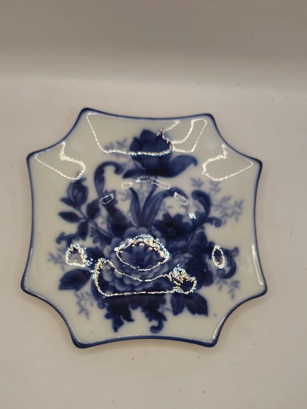Blue and White Floral Porcelain Teacup with Matching Saucer
